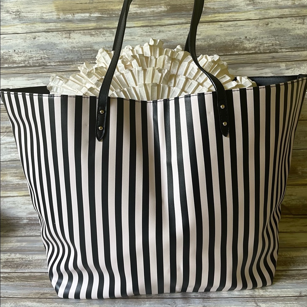 Victorias Secret tote bag.